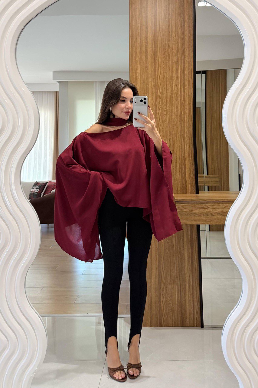  Chemisier cape, blouse fluide, top ample, chemisier asymétrique (si applicable), tunique femme.
Style : Élégant, chic, sophistiqué, moderne, tendance, bohème chic, décontracté chic, tenue de soirée, look professionnel (avec les bons accessoires).